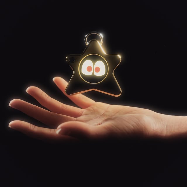A small pocket camera device held in one hand, ready to shoot